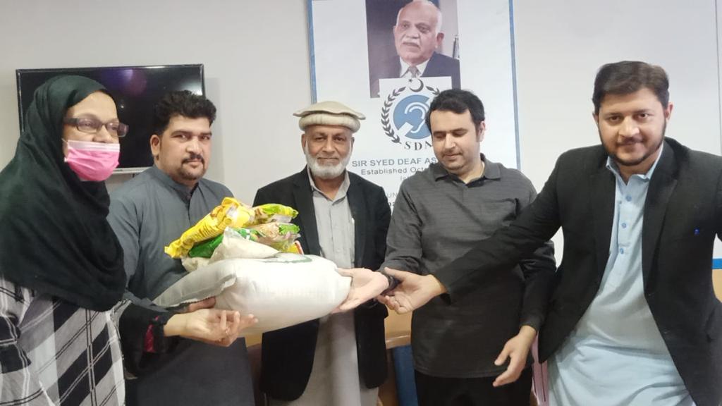 President SDA distributing Rashan