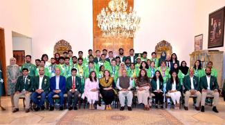 Group photo President Alvi and Frist lady with Pakistan Special Olympics winners