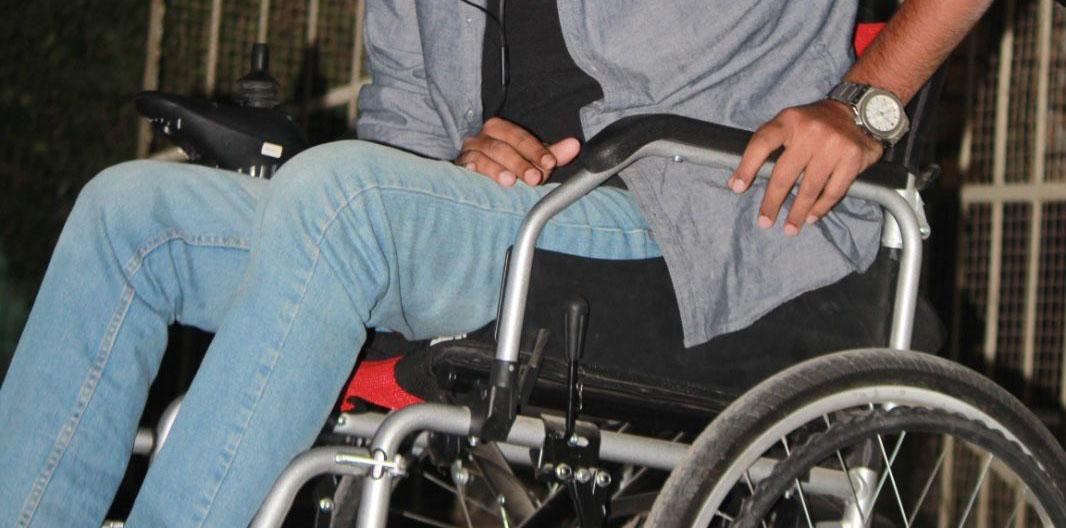 a man on wheelchair 